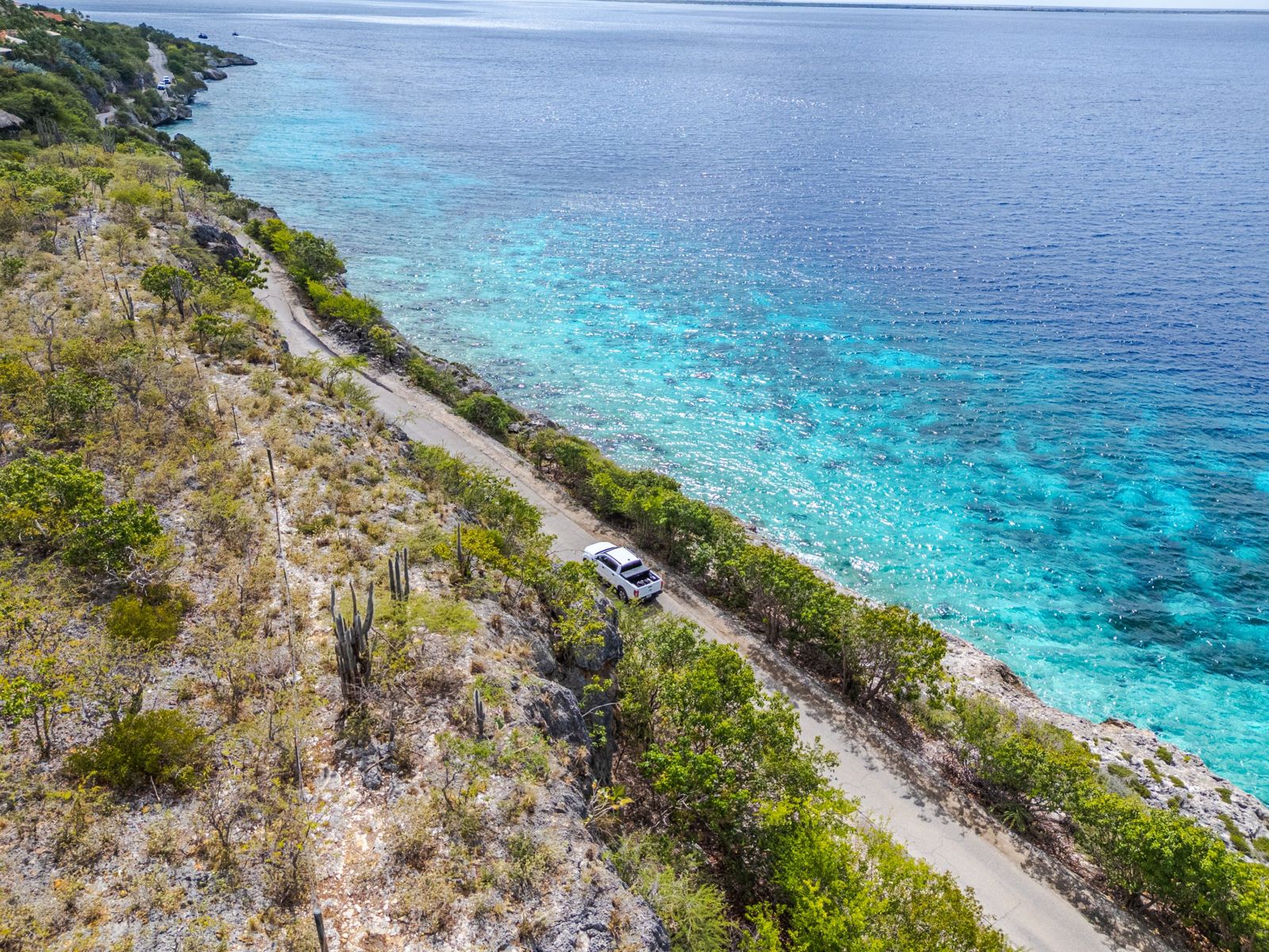 Aerial view of a Ranger on the coastal road along the reef